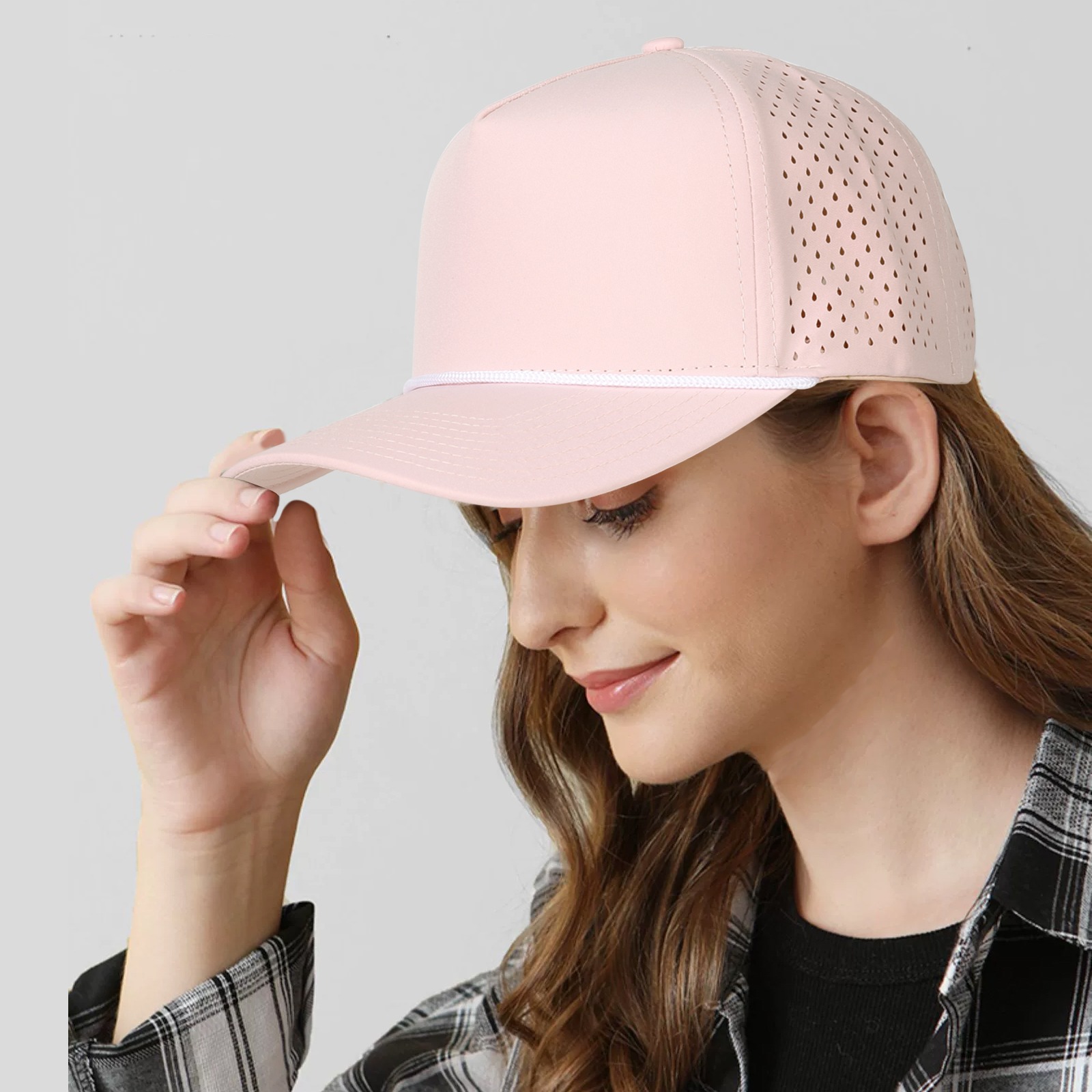 Woman wearing pink All Sport cap